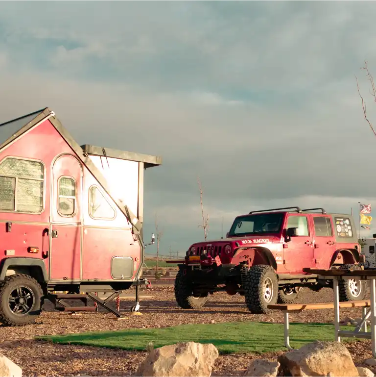 Jeep and trailer parked